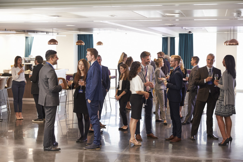 Workers attending an office fundraiser
